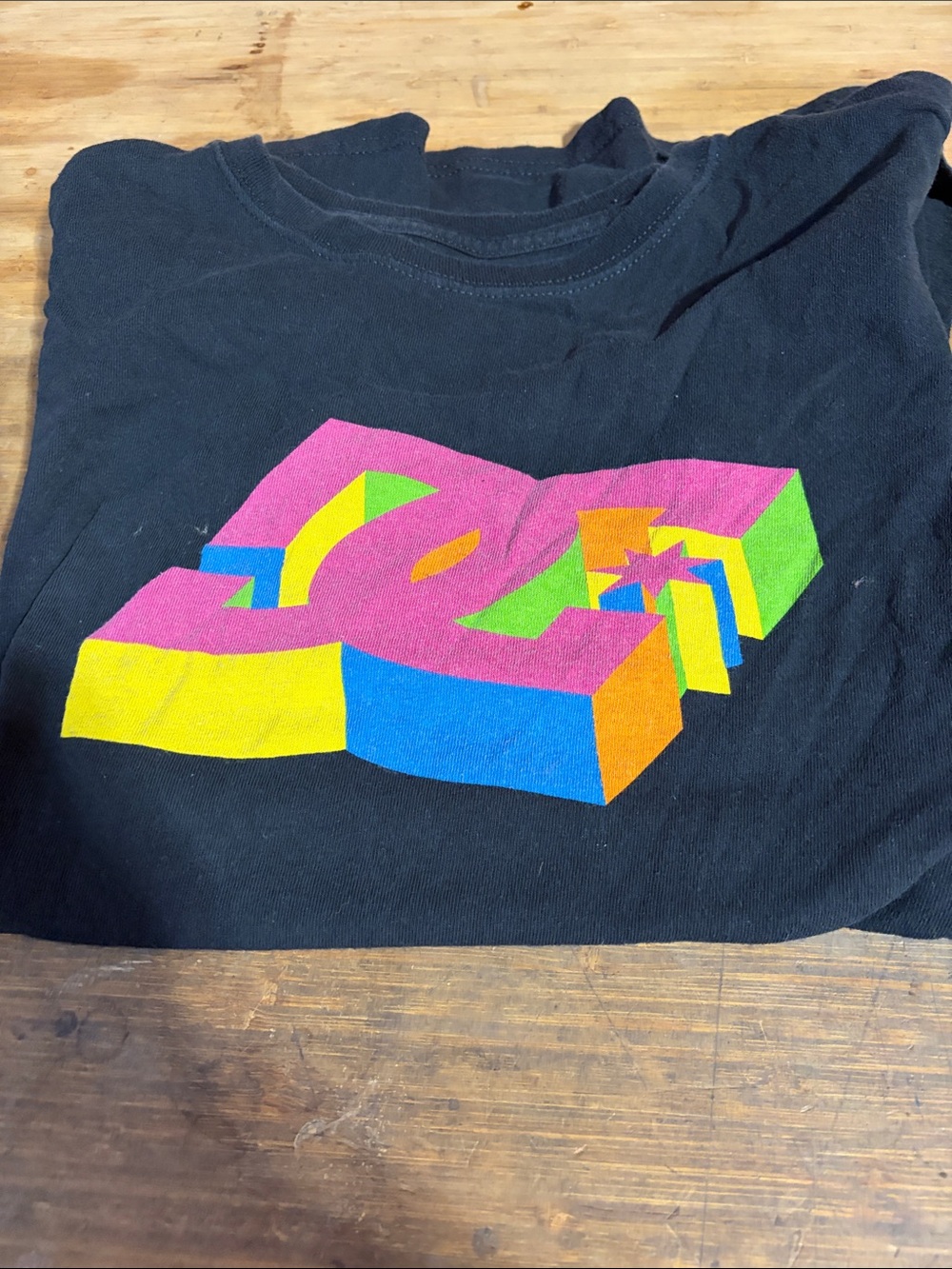 DC Men’s Black Short Sleeve Tee with Bright Multicolor 3D Logo
